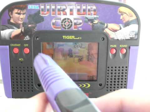 VIRTUA COP SEGA / TIGER Laser gun shooting handheld game