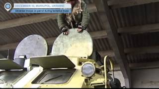 Ukrainian soldiers on frontline patrol base in Mariupol during tentative ceasefire
