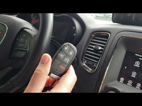 ვიდეო: როგორ იწყებ 2015 წლის Dodge Durango-ს გასაღებით?