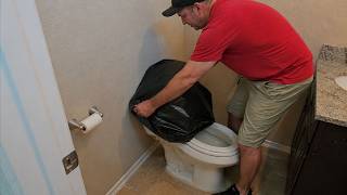 Slip A Trash Bag Over Your Toilet (This Is Genius)