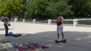 Crazy Asian guy on Hoverboard in Madrid