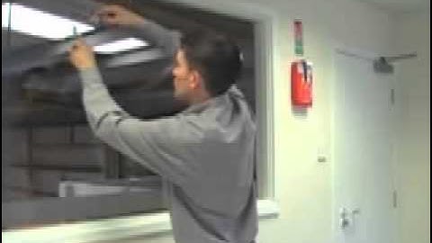 installation of the touch foil on glass