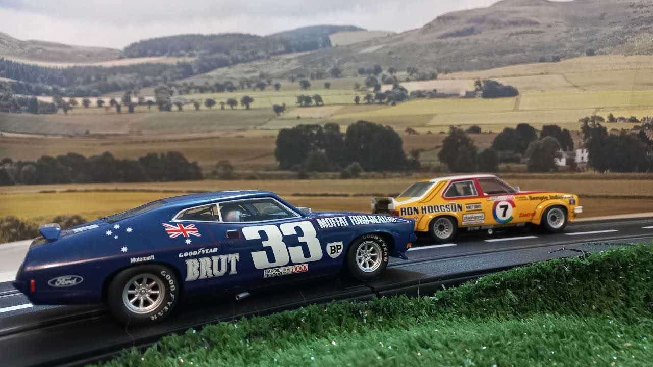 Slot Car Track Scenery. Glueing on a back scene...