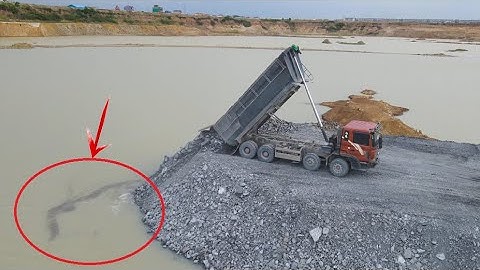 Incredible Amazing power machinery bulldozer can do push stone build road in lake