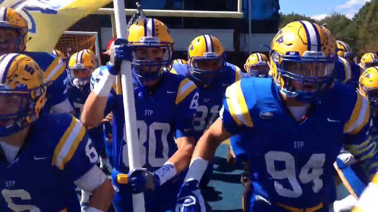 St. Peter's Eagles rush camera at Homecoming