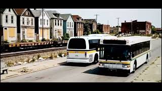 DDOT RTS NOVA DRIVING DDOT LOW FLOOR BY RAILROAD TRACKS & OLD BORDED UP HOUSES DETROIT CITY