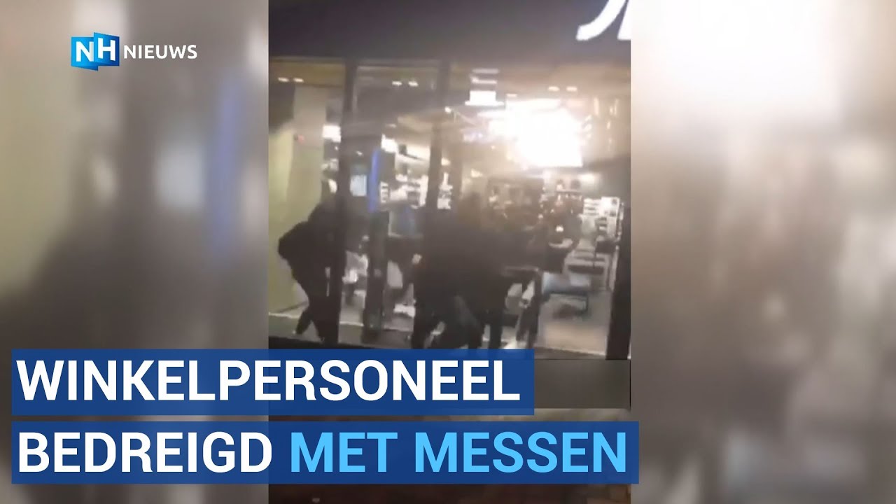 Jongeren plunderen sportwinkel in Amsterdam - YouTube