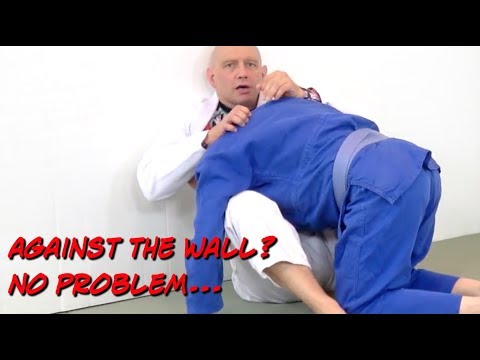 How to Use a Wall or a Fence While Grappling