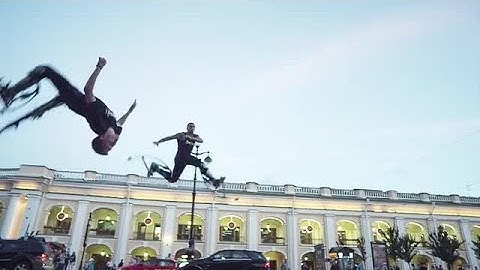 Jumping Stilt Performers Stock Video