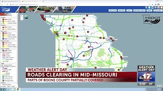 Road crews out in full force as snowfall continues