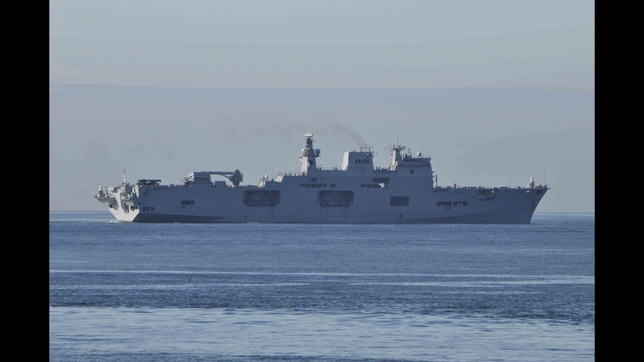 HMS OCEAN L12 PASSING THE BREAKWATER IN PLYMOUTH SOUND - 26th June 2017