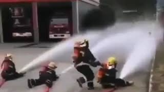 Firefighters Spraying Hose Meme