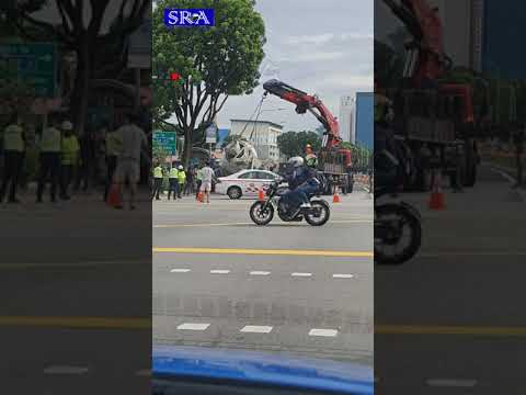 Cement truck overturn beside Bugis MRT