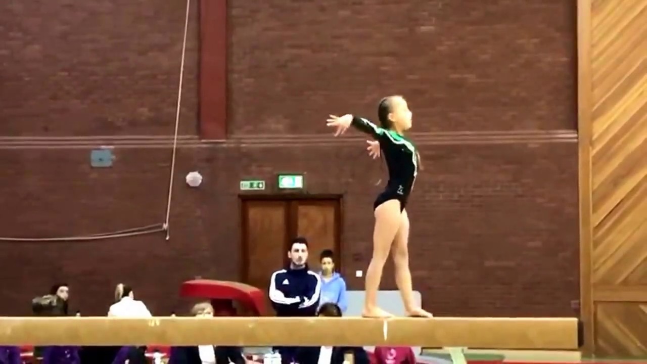 Gymnast beam routine and fall YouTube