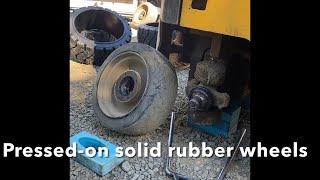Changing a PressedOn Forklift tire