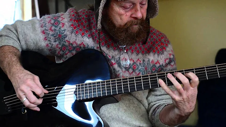 Daniel Macke plays the arch top baritone jazz guit...