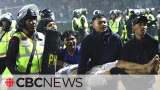At least 125 killed in Indonesia soccer stadium stampede