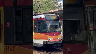 Pv5 light rail 1152 1146 arriving at Ming Kum station ￼￼￼