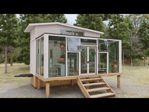tiny-house-on-wheels---shipping-container-house---tiny-house-on-field.