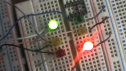 dos semaforos controlados con un pic16f887