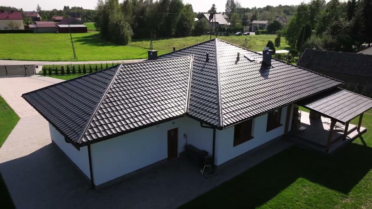 Realizacja REGAMET w Szczucinie - blachodachówka MONA 9005 EXELENT