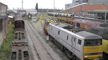 Wabtec Rail 08853 shunting East Coast 91119 at Doncaster West Yard