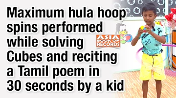 Maximum hula hoop spins performed while solving Cubes and reciting a Tamil poem in 30 seconds by kid