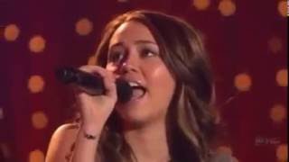 Miley and Billy Ray Cyrus singing on Dancing with the Stars