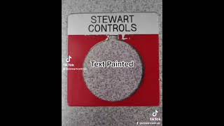 Engraving a 30mm push button legend plate.
