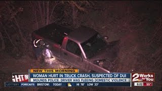 Woman hurt in truck crash, suspected of DUI Woman hurt in truck crash, suspected of DUI