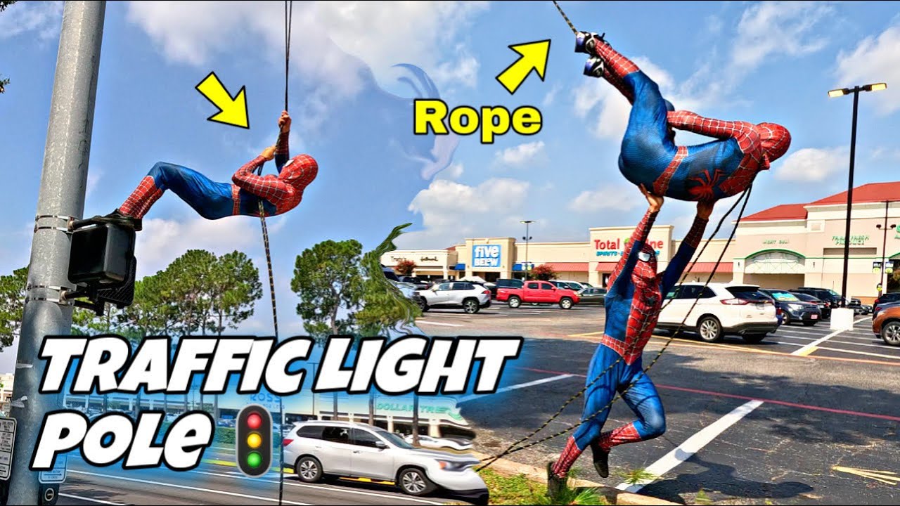 Spider Man Swinging From A Traffic Light Pole MUST WATCH