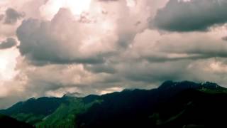 Cloud shadows highlight mountain terrain 40x