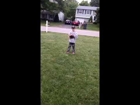 Noah Reitz playing catch on Pitchback in Front Yard - YouTube