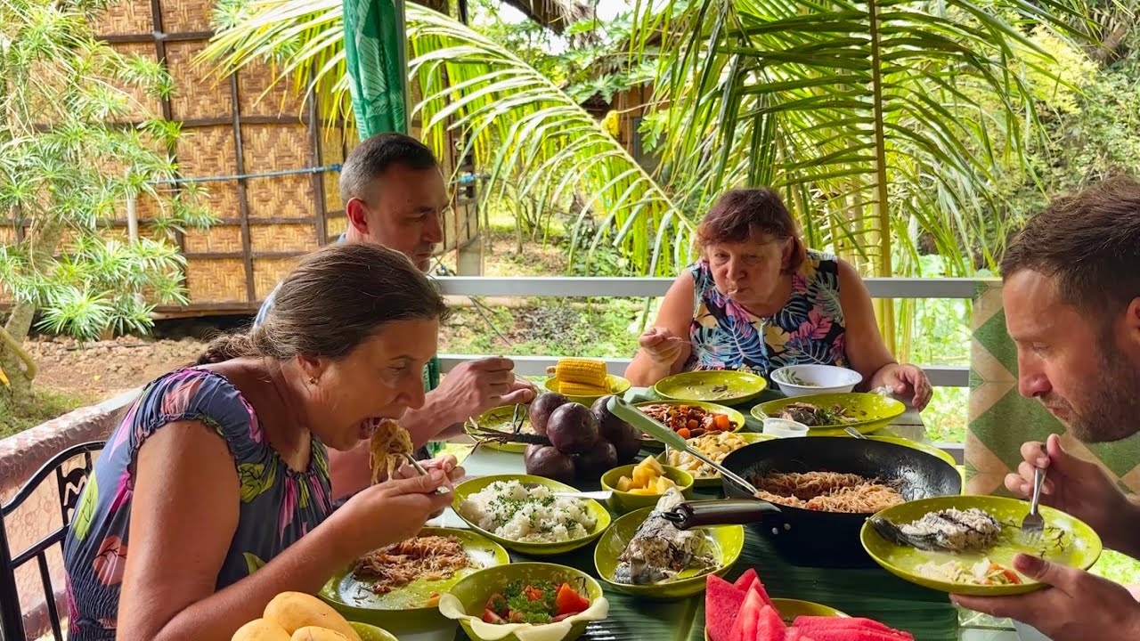 A married couple from Russia can't contain their delight at the Filipino cuisine.
