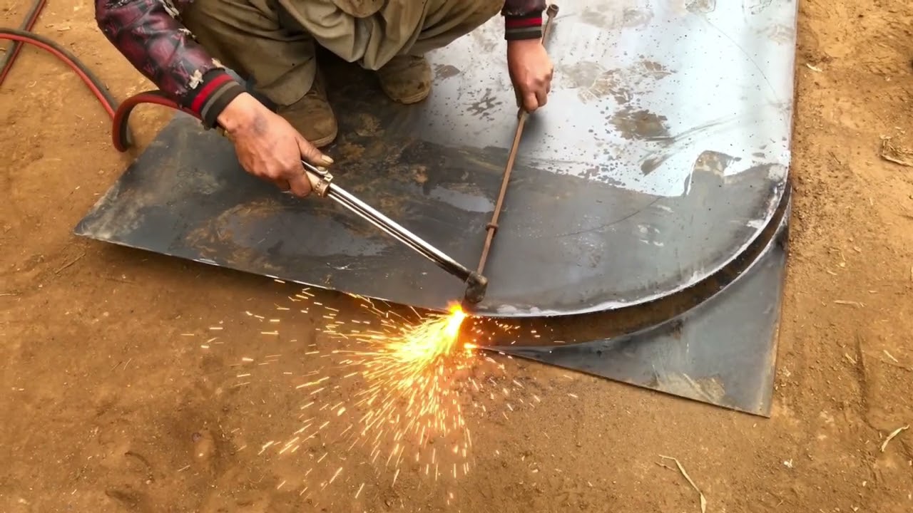 Amazing process of making of cutter wheel shield with gas cutter in local factory .