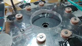 Bucking permanent magnet flat disc alternator (BPMFDA) hand spin test and construction