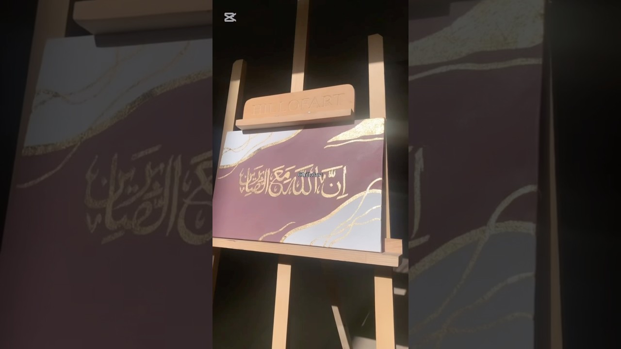 Applying gold leaf on canvas. 