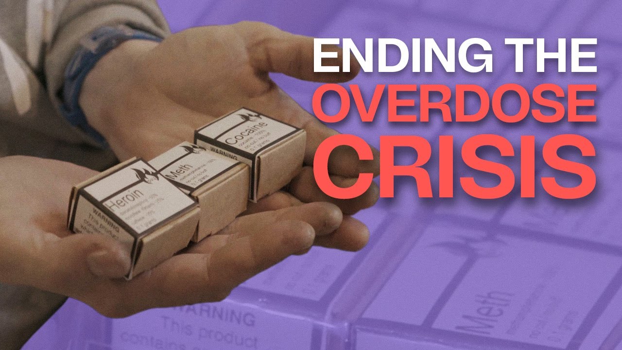 Why are activists and a city councillor handing out free drugs?