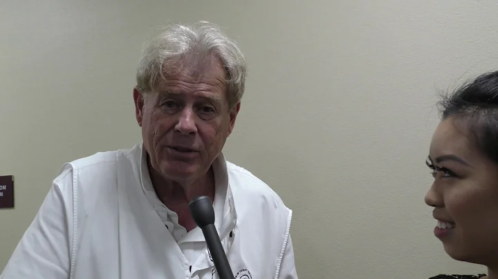 Lornie Kuhle gives advice to his daughter Jennifer...
