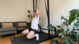 Ring Rows with Bent Knees