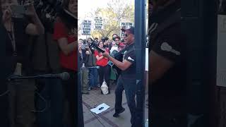 Tom Morello performs &quot;Killing In the Name&quot; at USC rally for Palestine. Credit: Carla Green