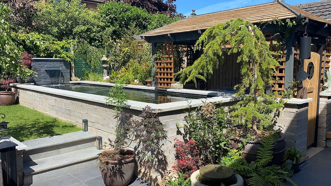 Прекрасный пруд объемом 3800 галлонов и сад! Владелец сам установил систему Nexus!