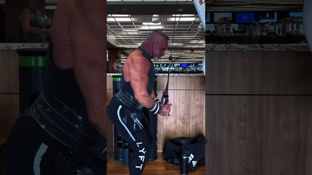Underhand grip tricep pushdowns using your power straps as handles are a great way to hit your tris