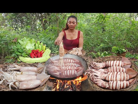 Seafood yummy! Squid salad cooking with chili sauce for food in forest - Solo cooking in jungle