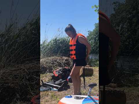 Girl Swimming On A SUP Board Outdoors Swimming Relaxing 