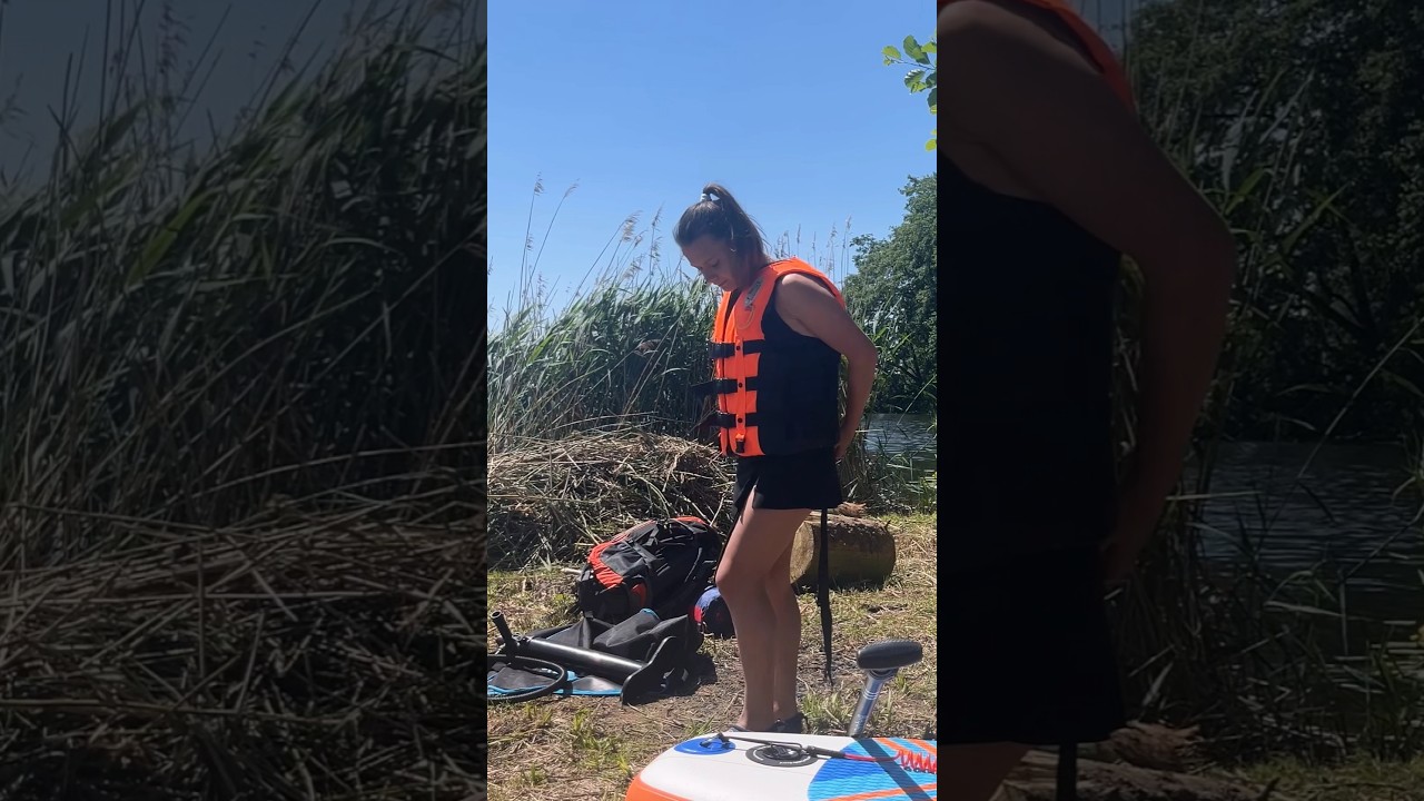 Girl swimming on a SUP board  