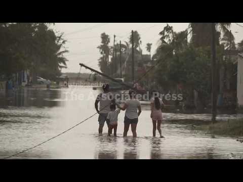 Mexico residents return to flood-damaged homes after Hurricane Polo