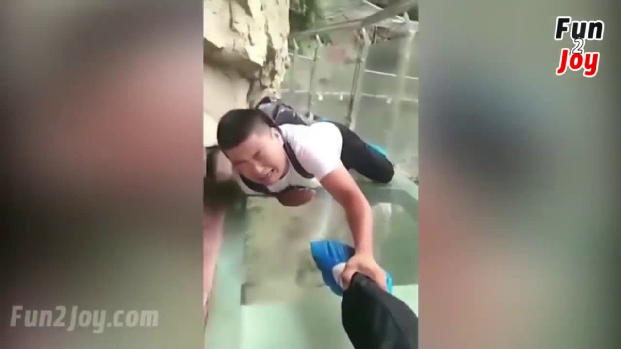 China Zhangjiajie Glass Bridge crack effect. YouTube