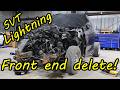 Pulling and cutting the front end of the wrecked SVT Lightning and the totaled F150 parts truck.