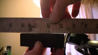 Checking wood for flatness by John A Tuttle from Player-Care.com